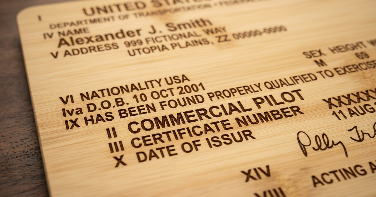 Custom engraved pilot license bamboo serving board with FAA certificate design, ideal for serving and display.