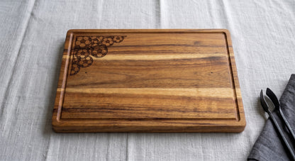 Engraved acacia wood serving board with soccer football fan design, perfect for charcuterie and cheese display.