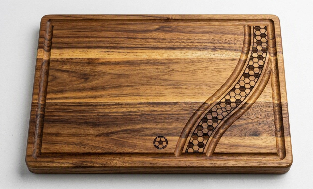 Engraved acacia wood serving board with soccer football fan design, ideal for charcuterie and serving snacks.