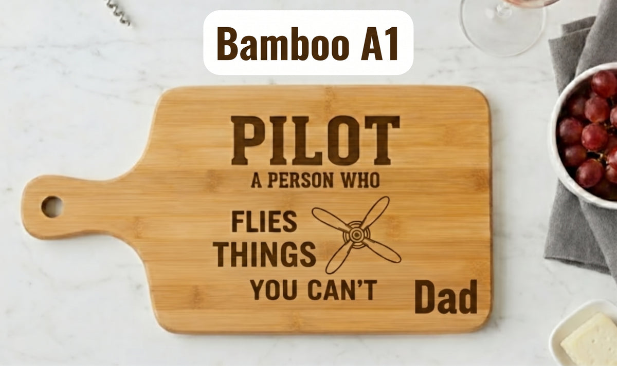 Personalized bamboo pilot definition serving or cutting board with engraved pilot gift design by The Present Spot.
