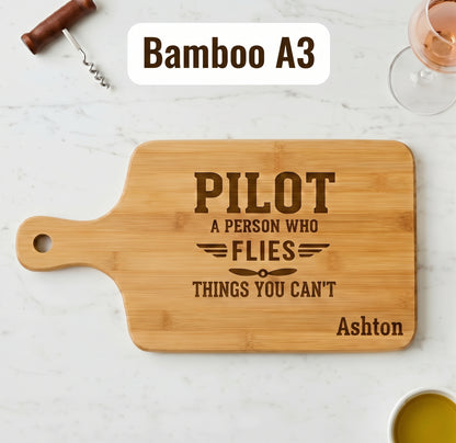 Personalized bamboo pilot definition serving board with engraved pilot gift design, ideal for serving or cutting.