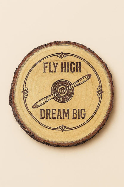 Set of four pilot-themed coasters from The Present Spot, featuring inspirational "Fly High, Dream Big" design in cork or other material.