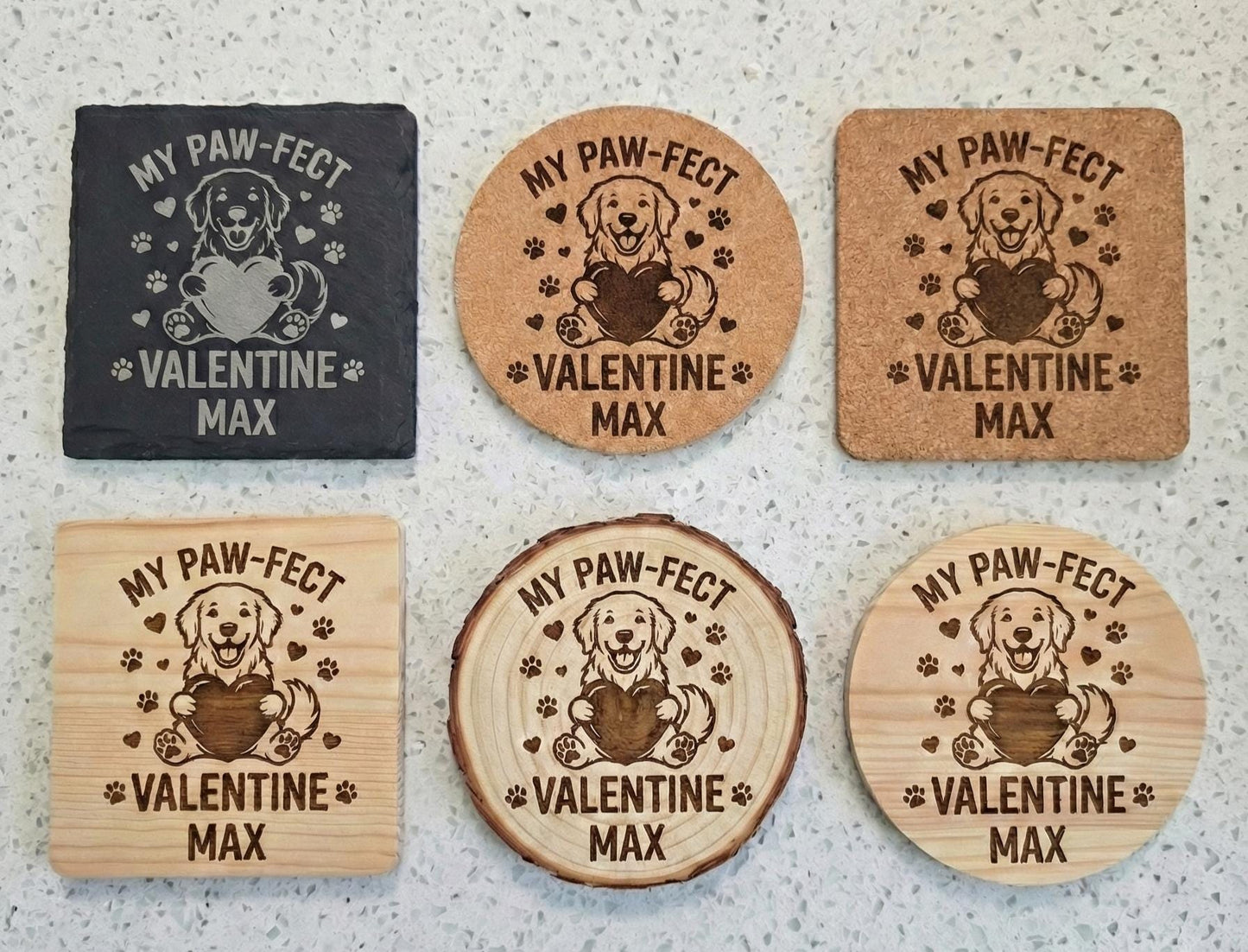 Set of four personalized pet slate coasters engraved with dog and cat names, perfect as a pet-themed gift.