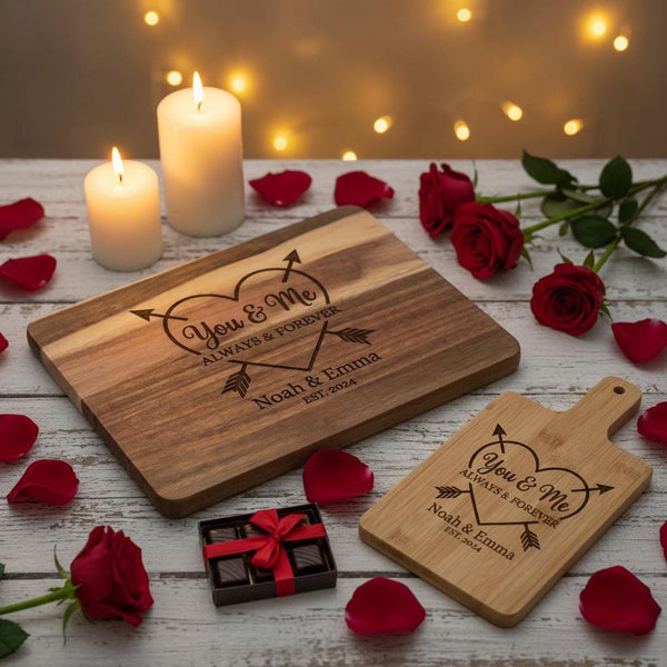 Personalized couple cutting board by The Present Spot, made of acacia wood, perfect for anniversary or Valentine's Day gifts.