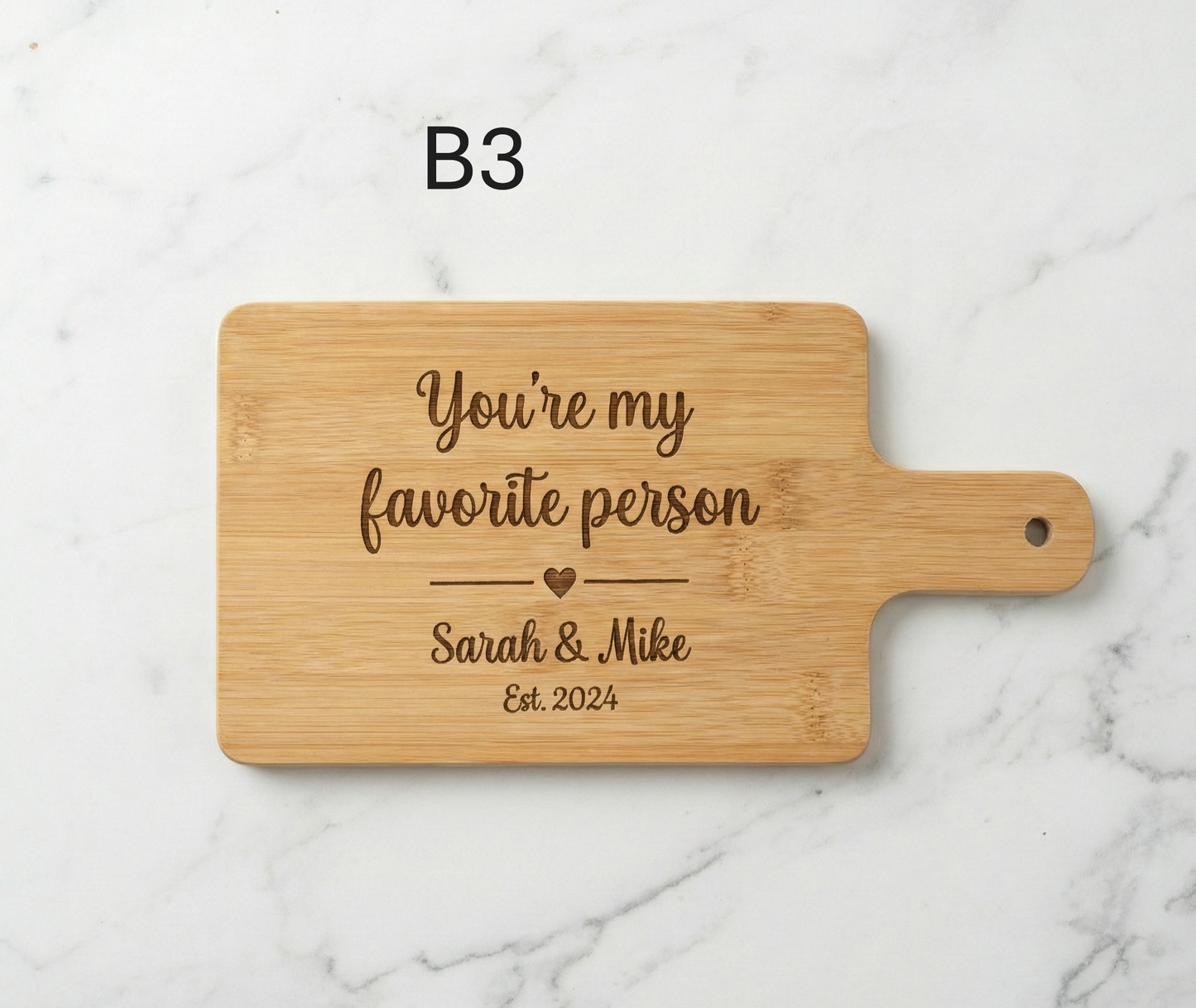 Personalized couple cutting board by The Present Spot, acacia wood, 14x10 inches, ideal for anniversary or Valentine's Day gift.