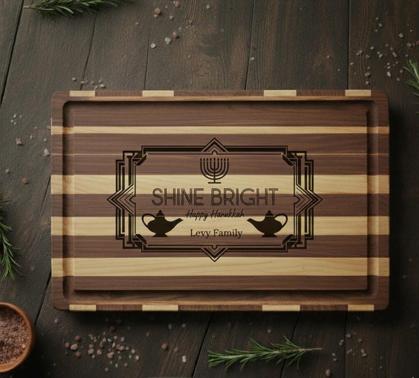 Personalized Hanukkah cutting board by The Present Spot featuring engraved menorah design on acacia or bamboo wood.