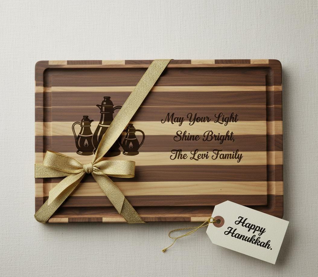 Personalized Hanukkah cutting board by The Present Spot featuring engraved oil lamps and family name in acacia wood, Jewish gift.