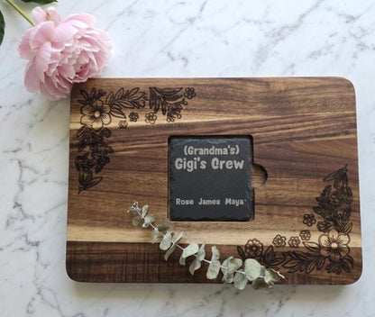 Personalized Serving Board with Slate Inlay by The Present Spot, showcasing a wooden cutting board with custom engraving and elegant slate detail.