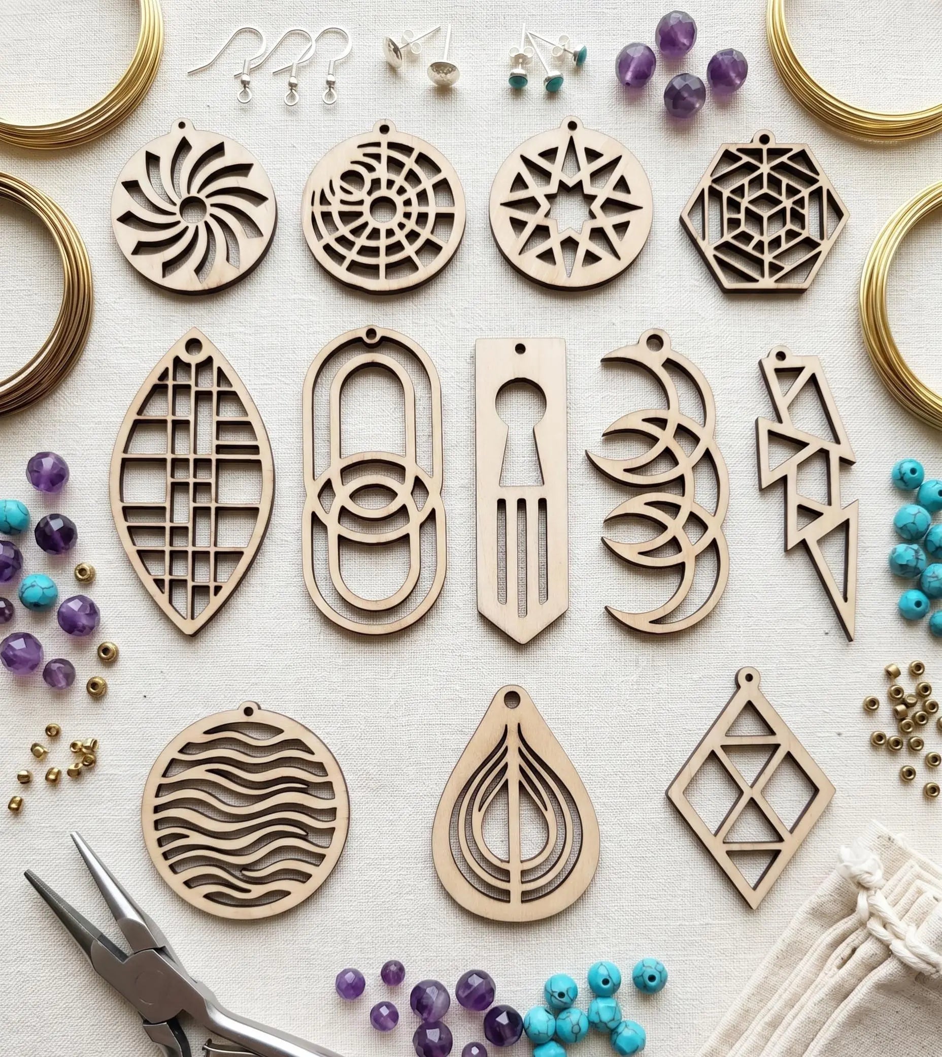 Wood Earring Maker Kit by The Present Spot with 20 blank wooden earrings, fishhooks, display cards, and bags for jewelry craft.