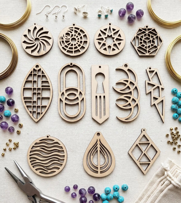 Wood Earring Maker Kit by The Present Spot with 20 blank wooden earrings, fishhooks, display cards, and bags for jewelry craft.
